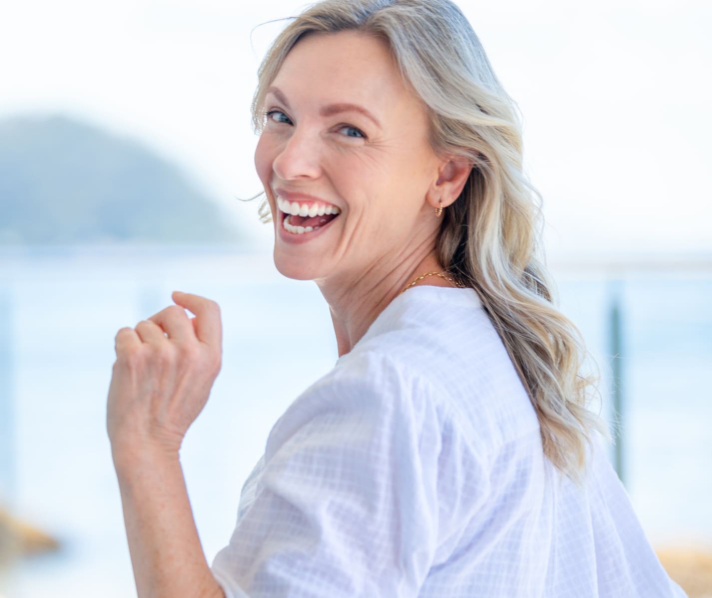 Beautiful mature woman portrait at waterfront house. Skinvive by Juvederm in Charleston County, SC